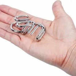 ICollection Metalen IQ Puzzels - 8 Stuks - Breinbrekers - Type 3/Oranje - Schoencadeau -Exporteren puzzels winkel 550x399 19