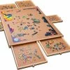 Puzzlr - Puzzelbord Met Opbergsysteem - Houten Puzzelplaat Onderlegger Met 6 Laden - 1500 Stukjes 2 Puzzlr - Puzzelbord Met Opbergsysteem - Houten Puzzelplaat Onderlegger Met 6 Laden - 1500 Stukjes -Exporteren puzzels winkel 550x505 4